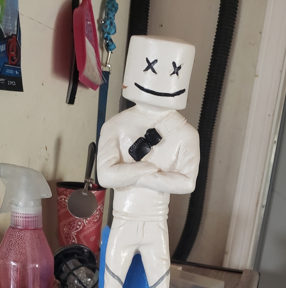White Figurine with Black Accents